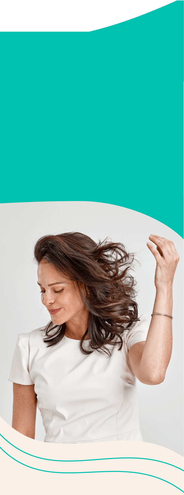 A woman enjoys her beautiful hair.